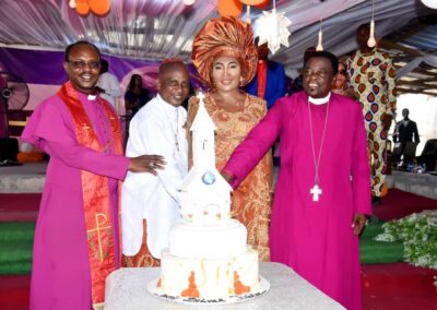 Cutting of the Anniversary cake by the Celebrants and surrounded by Archbishops Goddowel Avwomakpa and Solomon Gbakara!