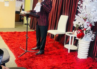 His Lordship, Bishop Fred K. Arutere Esq. teaching and making declarations to the US Congregants